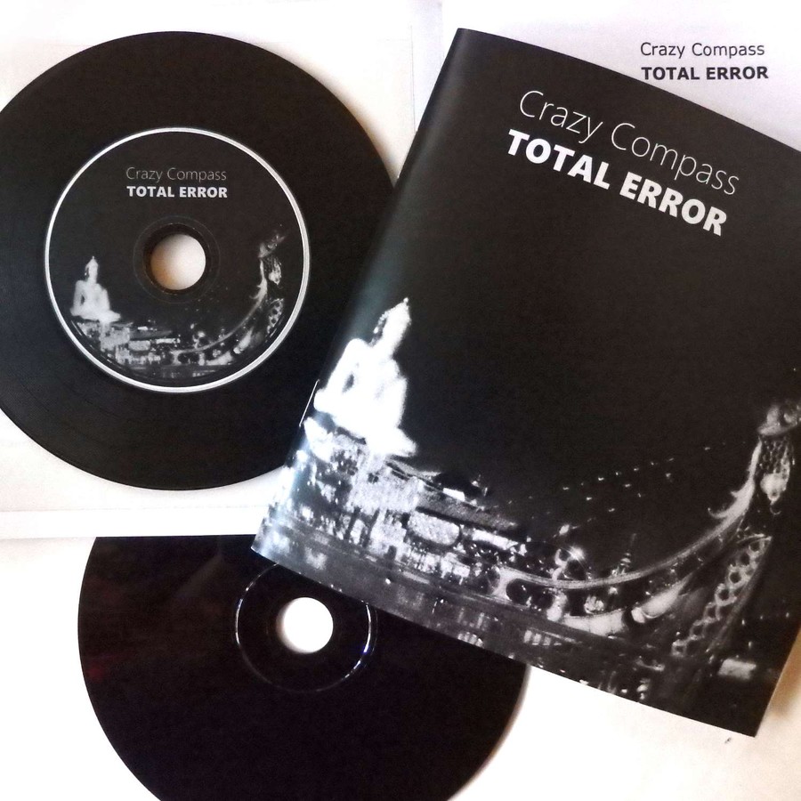 CD+book: Crazy Compass - TOTAL ERROR